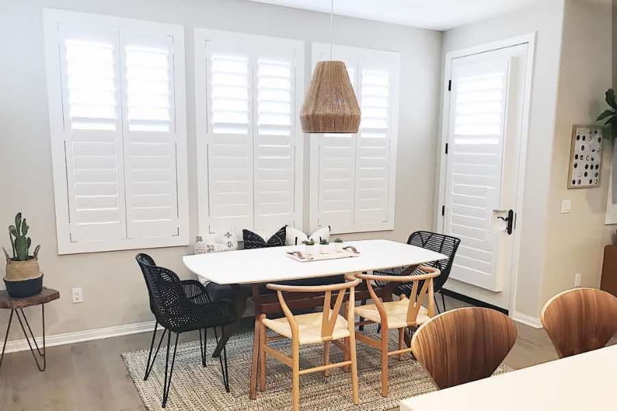 Use Polywood shutters to control natural light levels in your Hartford dining room. Polywood shutters with top louvers tilted open in a dining room
