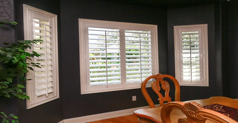 Crisp Polywood Plantation Shutters In Dining Room With Dark Paint