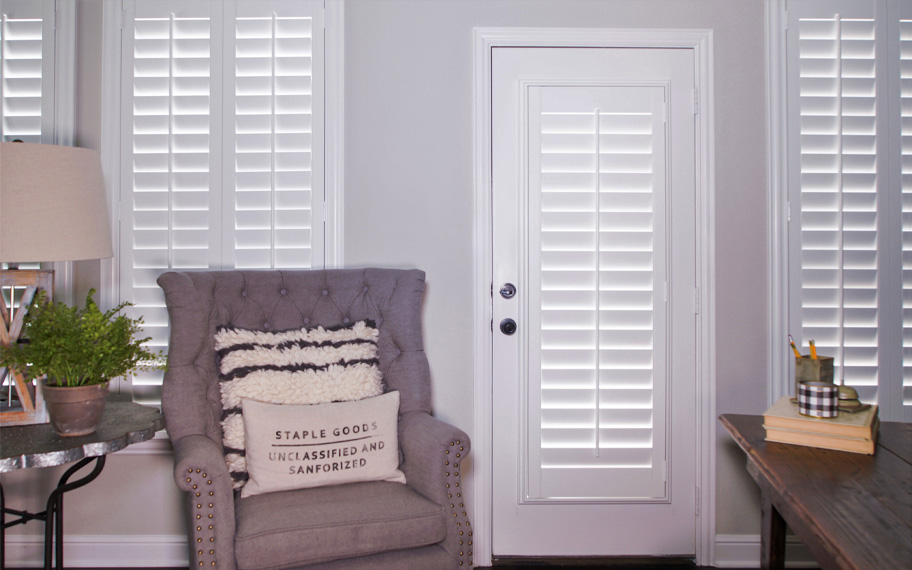 Interior shutters are beautiful and durable window treatments for glass doors in Hartford. Polywood shutters on a door