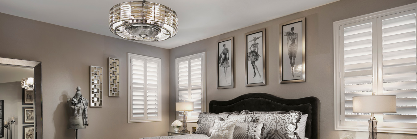 White shutters in a bedroom