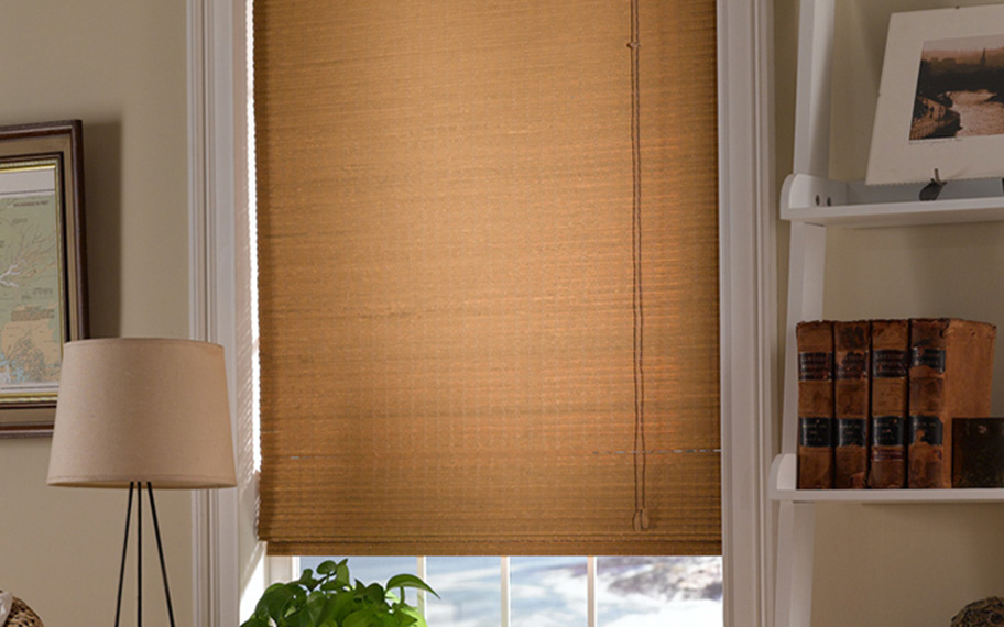 Add a touch of nature to your decor with woven fiber shades in Hartford. Tan woven fiber shades in a living room