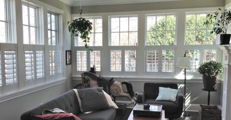 Cafe shutters in a sunroom in Hartford. Hartford cafe shutters sun room