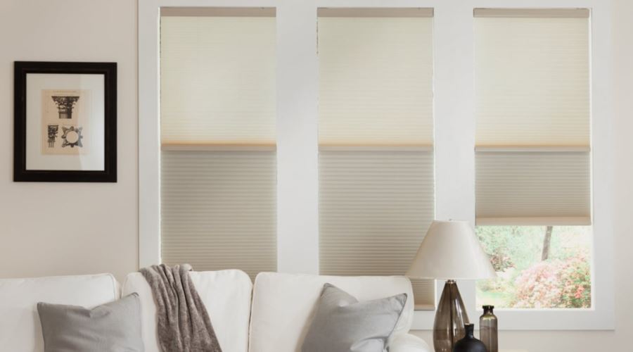 Cellular shades are energy efficient and stop air from entering through your window. Cellular shades in a Hartford living room