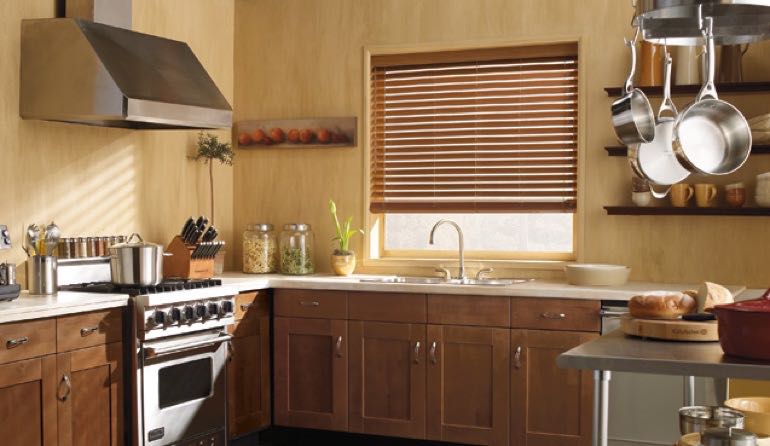 Faux wood blinds look amazing in Hartford kitchens. Hartford kitchen faux wood blinds.