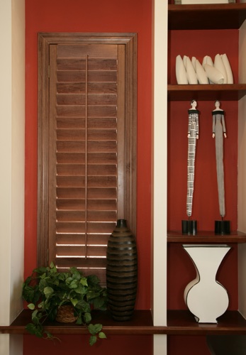 You can even match your wood shutters with shelving. Hartford wood shutter shelving