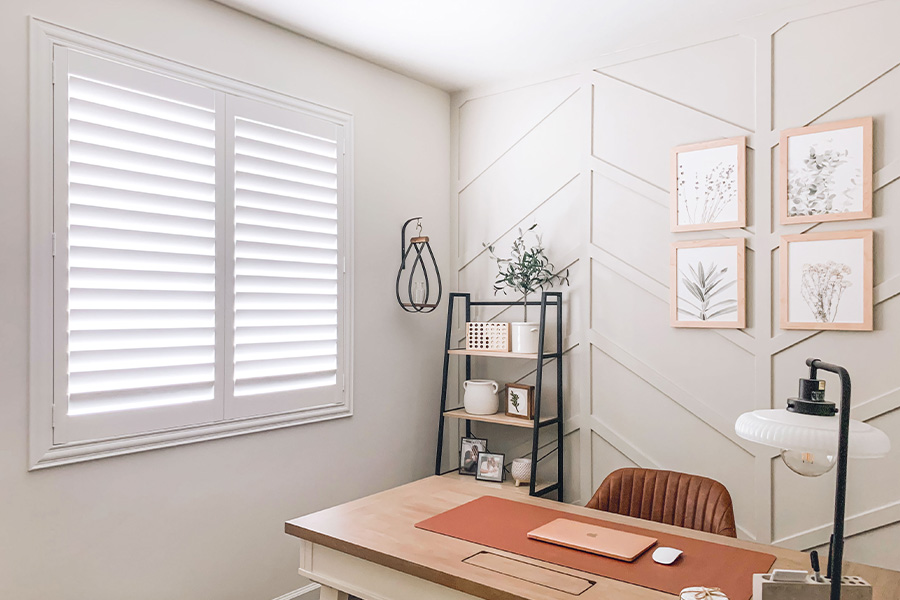 Polywood shutters give you maximum control over natural light in your Hartford home. Photo Credit: @OurLakepoint Farmhouse White and off-white farmhouse style office with natural light from polywood shutters.